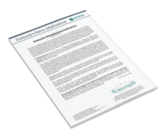 Ein Blatt Papier mit gedrucktem Text und dem Titel "Individuelle Gesundheitsleistungen" liegt schräg. Unten rechts isz Logo von der Privatklinik St. Wolfgang zu sehen.